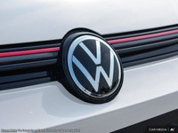 The 2025 Volkswagen Golf GTI in a striking white finish is a front-wheel-drive dynamo engineered to... (image 7)