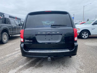 The 2016 Dodge Grand Caravan SXT Premium Plus 3.6L V6 is a minivan that blends family-friendly versa... (image 2)