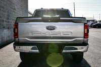 This 2023 Ford F-150 is for sale today. This crew cab 4X4 pickup has 64,855 kms. It's silver in colo... (image 4)