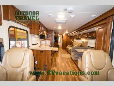 As you enter the Georgetown 335DS motor home by Forest River you will see to your left, a double kit...
