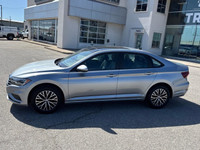 The Volkswagen Jetta Highline in a classic, sophisticated color is a stylish and efficient FWD sedan... (image 2)