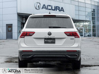 Finished in a Pure White exterior that complements the Black leatherette interior, standing on a set... (image 5)