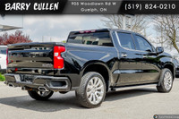 Experience the power and elegance of the black Chevrolet Silverado 1500 High Country, equipped with... (image 3)