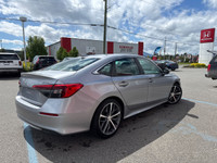 The 2022 Honda Civic Sedan Touring combines sleek styling, advanced technology, and impressive perfo... (image 3)