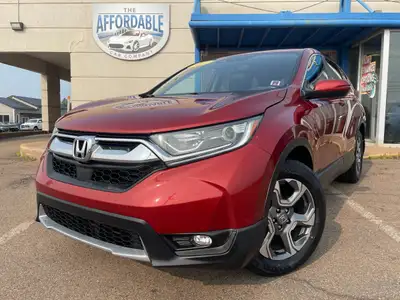 WAS: $25995 NOW: $24995Drive in comfort and confidence with this 2018 Honda CR-V EX-L AWD. Powered b...