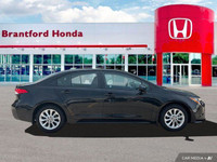 This sleek 2022 Toyota Corolla LE sedan in Black Sand Pearl is ready to enhance your daily commute.... (image 6)