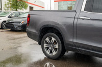 This 2019 Honda Ridgeline Touring brings together rugged capability, refined comfort, and advanced t... (image 4)