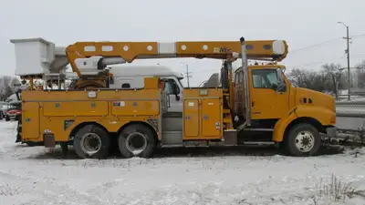 Well maintained 2006 Sterling LT 8500 tandem bucket truck C9 Cat 350 hp auto transmission Altec doub...