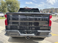 The 2023 Chevrolet Silverado 1500 RST blends rugged power with bold street style, featuring a Dark A... (image 4)