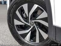 This Volkswagen Tiguan delivers a Intercooled Turbo Regular Unleaded I-4 2.0 L/121 engine powering t... (image 8)