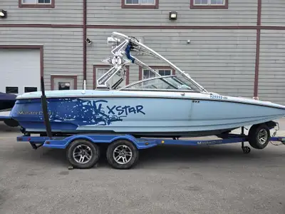 354 hours. Wakeboard Tower with clamping board racks new interior cockpit base seats. Fiberglass lin...