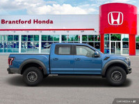 Dominate any terrain with this stunning 2019 Ford F-150 Raptor. This head-turning Blue Crew Cab boas... (image 6)