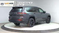 The 2025 Jeep Grand Cherokee L Limited 4x4, in a sophisticated gray, is designed to offer a commandi... (image 4)