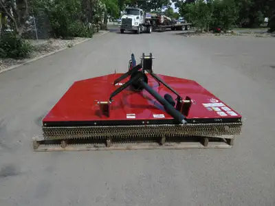 The 2023 Farm King 84in. Rotary Cutter is a heavy-duty compact attachment built for efficient mowing...