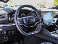 Experience the perfect blend of luxury, capability, and style with the sophisticated Black Jeep Wago... (image 7)