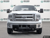 The 2014 Ford F-150 in pristine white is a robust 4x4 truck designed for those who demand power and... (image 2)