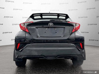 This 2022 Toyota C-HR, sleek and stylish in black, offers a practical blend of city-slick driving an... (image 5)