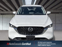 This 2025 Mazda CX-5 boasts a pristine white exterior and is ready for its next adventure, a fresh t... (image 1)