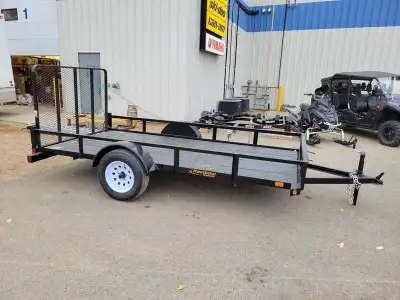 Solid and versatile!! 6x12 utility trailer with angle iron sides and rear lawn & garden ramp gate. R...