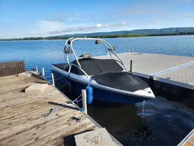 HIS BOAT IS IN AMAZING CONDITION! ONLY 400 HOURS! VDRIVE FOR WATER SPORTS! NAUTIQUE QUALITY SPEAKS F...