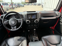 This well above average condition Jeep Wrangler Unlimited Sahara 4WD includes a 3.6L V6, heated leat... (image 9)