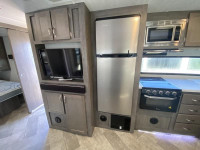 East to West Alta with bunkroom! This trailer features 2 slides, one in the main living area and ano... (image 7)