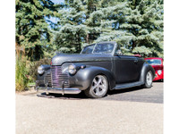 This 1940 Chevrolet Special Deluxe Cabriolet is powered by a LT1 5.7L V8 fuel injected engine that i... (image 2)