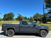 WAS: $61995 NOW: $58688 plus taxes and licensing feesA Truly RARE Find! 2025 Toyota Tacoma TRD Sport... (image 5)