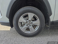 This AWD vehicle features heated front seats, a heated steering wheel, and a sun/moonroof for comfor... (image 9)