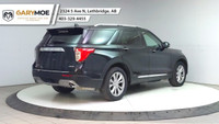 The 2024 Ford Explorer Limited 4WD in sleek black is a robust yet stylish SUV designed to conquer bo... (image 4)