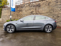 This Tesla Model 3 delivers a Electric engine powering this Automatic transmission. Window Grid Ante... (image 1)