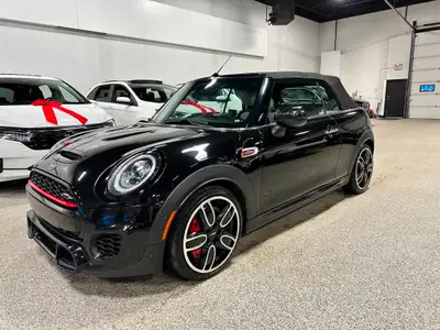 Enjoy a luxurious open-air joyride with our 2020 MINI Cooper Convertible John Cooper Works presented...