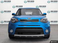 Experience the vibrant charm of the 2019 Kia Soul, presented in an eye-catching blue, paired with it... (image 2)