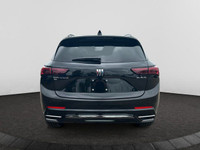 This 2025 Buick Envision in Ebony Twilight Metallic is equipped with AWD and Turbocharged Gas I4 2.0... (image 3)