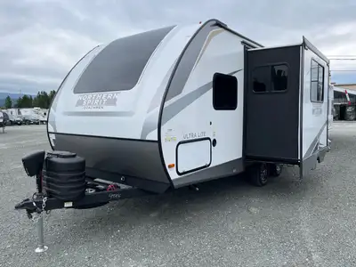 The perfect couple’s floorplan features a rear bathroom, L-Shaped kitchen counter top, an entertainm...