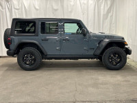 The 2025 Jeep Wrangler 4-Door Willys in stunning gray with 44 drive is a vehicle designed to conquer... (image 5)