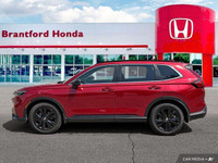 Experience the pinnacle of SUV versatility with this 2024 Honda CR-V Hybrid Touring, boasting a slee... (image 1)