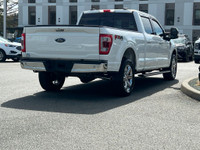 This 2021 Ford F-150 LARIAT has a Star White Exterior and Black Leather Interior with seating for 5.... (image 6)