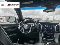 The 2019 Cadillac Escalade includes four-wheel drive, an adaptive air suspension, and power retracta... (image 8)