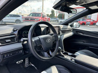 Experience effortless driving with this 2025 Toyota Camry SE, boasting a pristine white exterior and... (image 8)