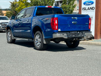 This 2019 Ford Ranger Lariat has a Lightning Blue Exterior and Ebony Leather Interior with seating f... (image 4)