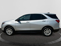 Offering excellent driving manners, this Chevrolet Equinox is SILVER in color and is equipped with a... (image 1)