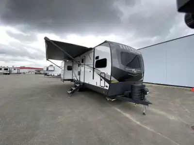 Forest River Rockwood Signature travel trailer 8264BH highlights: Triple Slides 72in.in. x 32in.in....