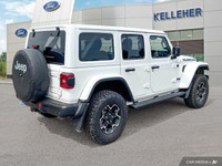 Conquer any terrain with this 2021 Jeep Wrangler 4xe Unlimited Rubicon, a plug-in hybrid that effort... (image 4)