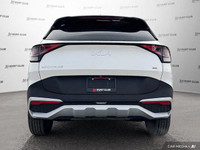 Experience the practicality and reliability of a 2023 Kia Sportage LX, boasting a sleek white exteri... (image 5)