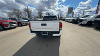 This Toyota Tacoma is equipped with: Fabric Seat Trim, Heated Seats, AM/FM radio, Apple CarPlay/Andr... (image 9)