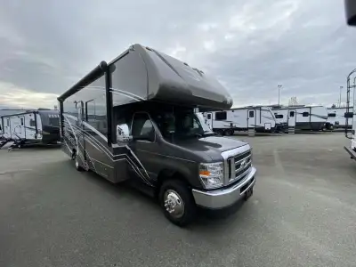 Winnebago Minnie Winnie Class C gas motorhome 26T highlights: Private Bedroom Bunk Over Cab U-shaped...