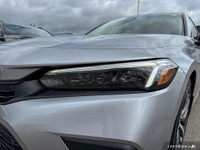 This 2022 Honda Civic Touring is a one-owner vehicle with no reported accidents, offering peace of m... (image 5)