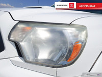 Check out this 2015 Toyota Tacoma 4WD Double Cab V6 Auto with 258,026 KMS, finished in a sleek White... (image 7)