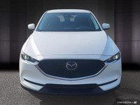 Le Mazda CX-5 GS AWD 2021 est un VUS intermédiaire qui se distingue par son design élégant, sa condu... (image 9)